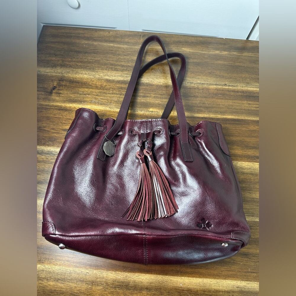 NWT Patricia Nash 10th Anniversary Plum Soft Leather Drawstring Witney Tote